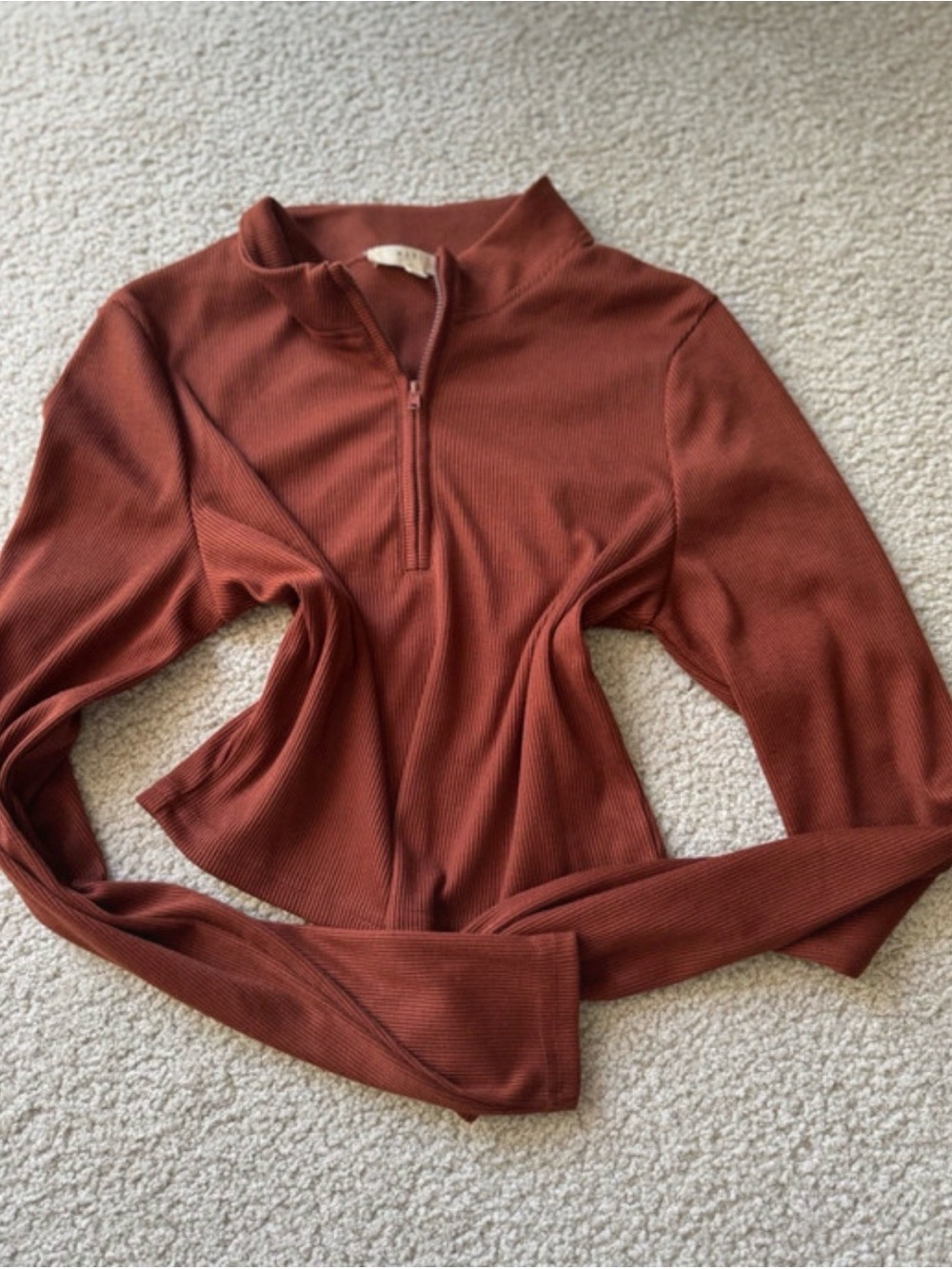 Ribbed Half-Zip Long Sleeve Top in Rust Brown cropped to
